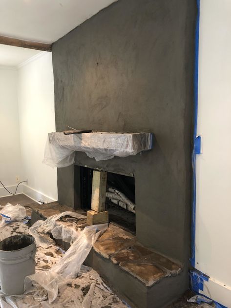 Stucco Fireplace Makeover, Fireplace Stucco, Diy Stucco, Fireplace Resurfacing, Rustic Wood Mantle, Brick Wall Fireplace, Concrete Fireplace Surround, Stucco Fireplace, Chic Office Decor