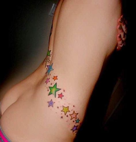 colorful shooting star tattoo on back Star Tattoos For Men, Star Tattoo Meaning, Ivy Tattoo, Shooting Star Tattoo, Scene Tattoo, Tattoos Infinity, Girl Back Tattoos, Free Tattoo Designs, Girls Tattoo