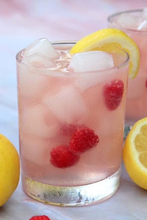 Raspberry Lemonade Vodka Spritzer | System of a Brown Raspberry Lemonade Vodka, Limoncello Cocktails, Coctails Recipes, Raspberry Vodka, Vodka Lemonade, Lemonade Cocktail, Refreshing Summer Cocktails, Spring Cocktails, Pink Cocktails