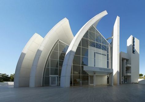 RHYTHM  Rhythm in architecture is the repetitive use of a group of visual themes.  This building shows rhythm through the turning and shifting of similar elements.  This building displays rhythm by having various sized "fins" being repeated. Rhythm In Architecture, Richard Meier Architecture, Richard Rogers, Fibreglass Roof, Richard Meier, Modern Church, Roof Architecture, Sacred Architecture, Renzo Piano