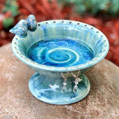 Mini birdbath jewelry holder #forsale.  : : #pottery #handmade #potteryvideos #potteryvideo #lovenature #nature #wheelthrownpottery #pottery #handmadepottery #ceramica #ceramics #pottersofinstagram #anasclayhouse #potterylove #potterylover  #contemporaryceramics #contemporaryart #thrownandaltered #birdlover #artebrasileira #lagunaglaze #jewelry #jewelrylover #jewelryholder #earringholder #bluebirds Ceramics Ideas Pottery Jewelry Holder, Handmade Ceramic Jewelry Holder, Ceramic Pottery Birdbath, Cute Ceramic Jewelry Holder, Earring Holder Pottery, Ceramics Earring Holder, Diy Ceramic Jewelry Dish, Jewerly Holders Ceramic, Jewelry Organizer Pottery