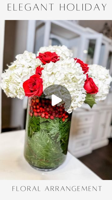 Janine Graff on Instagram: "Elegant Holiday Floral Arrangement celebrates the season with a simple yet striking festive-themed floral centerpiece!

Love this for a Christmas wedding centerpiece, holiday hostess gift or for your Christmas tablescape. 

❤️ Embrace the holiday spirit and create your own masterpiece!

Start by filling your vase with cranberries and lush greens to instantly elevate your arrangement. Then, I selected red and white flowers from the grocery store and used a tape grid to evenly arrange them.

#floralarrangement 
#christmasflorals #christmascenterpiece #christmasdiy" Janine Graff, Christmas Wedding Centerpieces, Holiday Floral Arrangements, Christmas Greens, Diy Floral Decor, Christmas Decorations Centerpiece, Christmas Neighbor, Holiday Hostess Gifts, Red And White Flowers