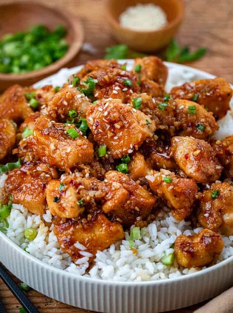 Honey Garlic Chicken Bites are seasoned cubes of chicken, pan-fried to golden brown and coated in a honey garlic sauce with a subtle kick from red pepper flakes. It may be my new favorite way to eat chicken!