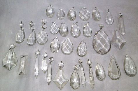 I have chandelier crystals shown below on picture. I got it from my friend. They were removed from chandelier and replaced by colored ones. Any ideas where can I use them. Thank you. Chandelier Diy Crystal, Crystal Suncatchers Diy, Clear Glass Chandelier, Old Chandelier, Swarovski Christmas, Chandelier Crystals, Old Lamps, Diy Chandelier, Antique Chandelier