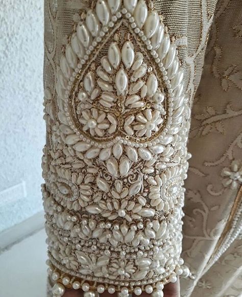 Pinterest: @pawank90 Couture Beading Embellishments, Indian Embellishment Details, Pearl Beads Embroidery, Couture Embellishment Details, Indian Embroidery Motifs, Beading On Fabric Embellishments, Pearl Beading Dress, Bridal Embroidery Designs, Pearl Handwork Embroidery