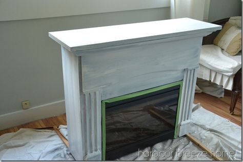 Refinish Electric Fireplace, Distressed White Electric Fireplace, Electric Fireplace Makeover Diy Ideas, Painting Electric Fireplace Diy, Refinishing Electric Fireplace, Painted Faux Fireplace, Electric Fireplace Painting Ideas, Free Standing Fireplace Makeover, Painting An Electric Fireplace