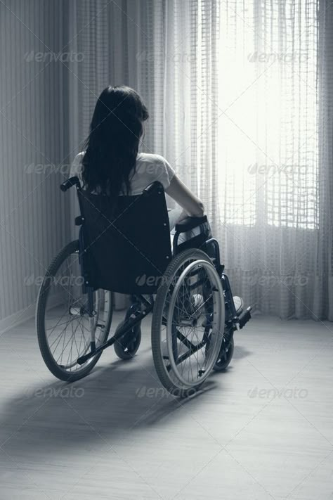 Sad woman sitting on wheelchair by stokkete. Young woman seated in a wheelchair looking out a window#sitting, #wheelchair, #Sad, #woman Driving Wheel Aesthetic, Wheelchair Reference, Wheelchair Aesthetic, Wheel Aesthetic, Wheelchair Photography, Wheelchair Women, Wheel Chair, Woman Sitting, Valentine Photography