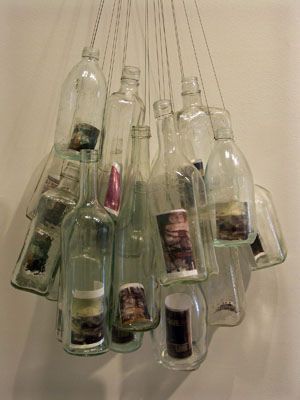 Clear Glass Bottles + hanging wire + photos = Awesome Hanging Photo Display: Photography Presentation Ideas Display, Gcse Photography Final Piece Presentation, Photography Presentation Ideas, Gcse Photography Final Piece, Photography Final Piece Ideas, Polaroid Display Ideas, Photography Exhibition Display, Glass Bottle Photography, Photography Final Piece