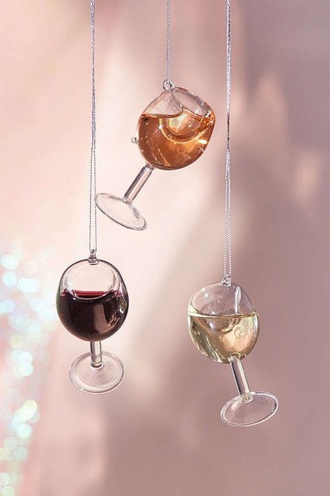 Urban Outfitters Wine Glass Christmas Ornament, $12, available at Urban Outfitters. Wine Glass Christmas Decorations, Wine Christmas Tree, Glass Ornaments Diy, Glass Christmas Tree Decorations, Wine Glass Christmas, Wine Christmas, Clever Gift, Wine Decor, Glass Christmas Tree Ornaments