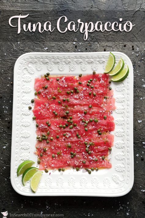 Lime juice, capers, and red onion turn slices of tuna into something spectacular. This tuna carpaccio makes a great appetizer or light lunch. #tunacarpaccio #appetizer #recipe Raw Tuna Recipe, Tuna Carpaccio, Carpaccio Recipe, Raw Tuna, Tuna Recipes, Sushi Recipes, Light Lunch, Great Appetizers, Fish Dishes