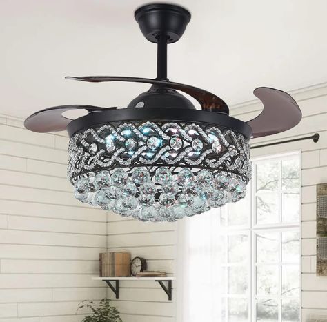 PRICES MAY VARY. STUNNING FANDELIER: Top K9 crystal with premium black lamp body, the light on and off will show a different beauty. It is both a practical chandelier fan and a gorgeous decorative piece REMOTE CONTROL: 42"chandelier with fan has 3 color changes (cool-6500k/neutral-4500k/warm-3000k), timer setting (1/2/4/8h), 3 fan speeds, all functions can be controlled individually with the remote control RETRACTABLE CEILING FAN: High-quality ABS amber blade will automatically expand and contra Crystal Fandelier, Fancy Ceiling Fan, Chandelier With Fan, Elegant Ceiling Fan, China Cabinet Bar, Fandelier Ceiling Fan, Retractable Ceiling Fan, Crystal Ceiling Fan, Bookcase Organization