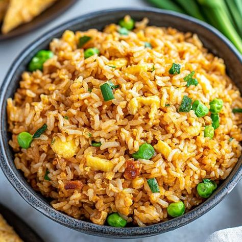 Looking for a quick and delicious meal? This hibachi fried rice recipe is perfect for busy weeknights. Made with simple ingredients like eggs, garlic, and soy sauce, this flavorful dish uses leftover rice for easy Easy Hibachi Rice, Quick Meals With Rice, Hibachi Fried Rice Recipe, Hibachi Rice, Hibachi Fried Rice, Patty Melt Recipe, Smothered Pork Chops Recipe, Easy Chicken Enchilada Recipe, Chicken Dumpling Soup