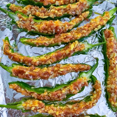 Make these super easy and delicious stuffed Italian long hot peppers for your next get together, or as a quick meal along with a big salad! Crunchy on outside, bursting with flavor on inside! Italian Pepper Recipes, Stuffed Italian Long Hot Peppers, Stuffed Long Sweet Peppers, Stuffed Long Hots With Sausage, Italian Sausage Stuffed Banana Peppers, Stuffed Long Peppers, Giant Marconi Peppers Recipes, Italian Long Hot Peppers Recipes, Italian Long Hots Recipe