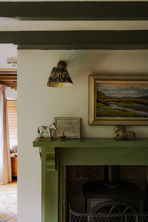 Ochre Yellow and Green Tones in a Cozy Welsh Cottage 4 Scandi Cottage Interior, Green Cottage Interior, Green Painted Fireplace, Green Cottage Living Room, Green And Yellow Interior, English Cottage Fireplace, Vintage English Cottage Interiors, English Countryside Interior, English Country Cottage Interiors