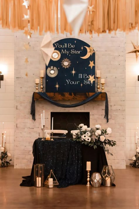 Beautiful altar with backdrop featuring stars and moons Moon And Stars Table Decor, Subtle Celestial Wedding, Star Bridal Shower Theme, Celestial Bridal Shower Theme, Whimsigoth Wedding, Moon Wedding Theme, Star Themed Wedding, Constellation Wedding, Celestial Wedding Theme