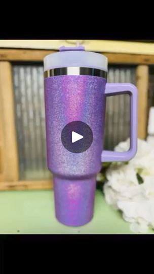 83K views · 1.9K reactions | Tack It Method Tumbler | One of my FAVORITE projects…my Tack It method glitter tumbler! | By Blessings Craft Therapy | Okay, friends. Get ready. I'm
going to show you my favorite technique. It's called the Tack
It Method. We're going to make a tumbler. Hey, everybody. It's
Colette with Blessings Craft Therapy. If you didn't know and
if you did, thanks much for coming back. Alright, so I got
this at five below. It's not a Stanley. I know. It's fine.
It's purple and I love it. So, we take the lid off. We're
going to use that later and then, I take my tumbler, wipe
it down, and then I'm going to use masking tape on the top and
around the handles. Could I have taken the handles off?
Sure but we, no got time for that so I just taped them off.
Um hindsight I probably Campfire Foods, Craft Therapy, Five Below, Alcohol Drink Recipes, Masking Tape, Drink Recipes, I Got This, Fun Crafts, Home Depot