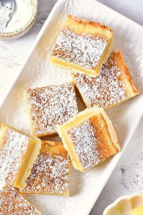 With a buttery shortbread crust topped with a tangy and creamy lemon filling, and sprinkled with powdered sugar, these gluten-free lemon bars are the perfect dessert for spring and summer! Totally dairy-free too. Gluten Free Lemon Bars, Cranberry Bliss Bars, Lemon Bars Easy, Lemon Bars Recipe, Lemon Custard, Lemon Squares, Buttery Shortbread, Lemon Dessert Recipes, Individual Desserts