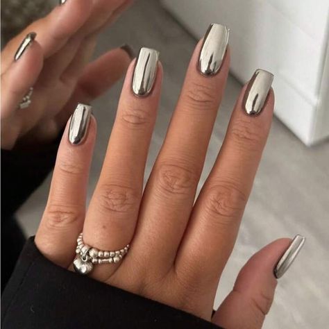 Chrome nails have taken the beauty world by storm, offering a stunning, mirror-like finish that adds instant glamor to any look. From subtle elegance to bold statements, chrome nail designs come in a variety of styles, colors, and finishes to suit every personality and occasion Silver Nails Medium Length, Chrome Nails Long Square, Grey Chrome Nails Designs, Silver Square Nails, Medium Square Nails Designs, Square Chrome Nails, Silver Nails Acrylic, Chrome Nails Square, Nails Medium Length Square