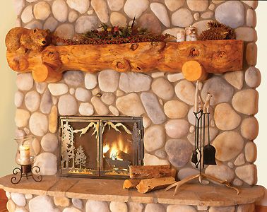 Half Log Mantels | Character mantel with hand-notched log supports that cradle the Log Mantle, Unique Fireplace, Mountain House Decor, River Rock Fireplaces, Rock Fireplace, Rustic Fireplace Mantels, Log Fireplace, Cabin Fireplace, Fireplace Mantles