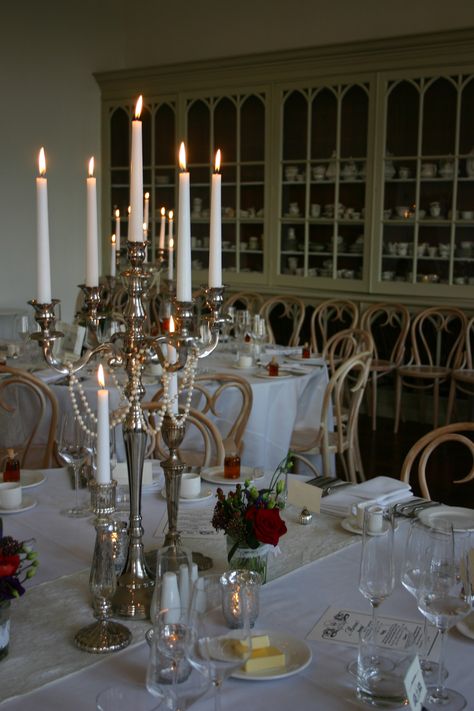 Decoration - candelabra strung with pearls (we'd have gold candleabra) Silver Candelabra Centerpiece, Candle Opera Centerpiece, Vintage Hollywood Wedding, Candelabra Wedding Centerpieces, Candelabra Wedding, Vintage Wedding Centerpieces, Silver Candelabra, Pearl Candle, Pearl Centerpiece