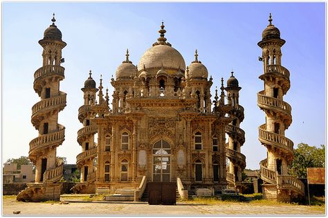 Bahauddin Ka Maqbara is situated in Junagrh Gujarat. This fine piece of 19th century architecture is the mausoleum of Vazir of Junagarh.   Photo: Prakhar Incredible India, Photo Mugs, Tourist Destinations, Made In America, Beautiful Destinations, Gifts In A Mug, Photographic Prints, Taj Mahal, Blue Sky