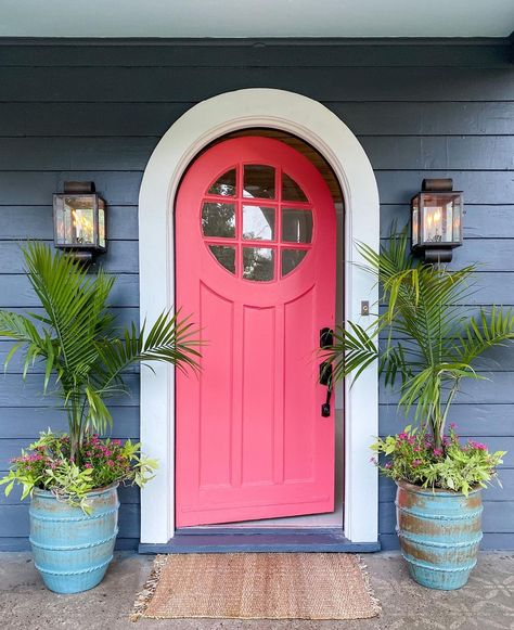 Bright Colored Front Doors, Fun Exterior Door Colors, Blue And Pink House Exterior, Pink Front Door Blue House, Colorful Doors On Houses, Bright Pink Front Door, Unique Front Door Colors, Fun Front Door Colors, Bright Front Door Colors