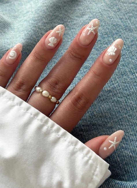 Your daily dose of the most viral beach nails from the biggest nail gurus! Find #summer 2024 nail inspo for the cutest summer nails, featuring ocean nails, vacation nails, beach nails, and tropical nails! #nails inspo #summernails Nails Starfish Design, West Coast Nails, Beach Nails Starfish, White Starfish Nails, East Coast Nails, Starfish Nails Design, White Detail Nails, Star Fish Nail Art, Zoifishh Nails