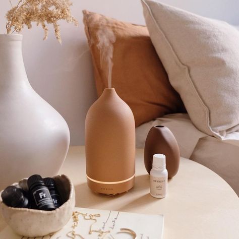 7 Chic Diffusers to Add to Your Bedroom ASAP | Hunker Vitruvi Diffuser, Neutral Architecture, Minimal Inspiration, Candle Alternatives, Architecture London, Stone Diffuser, Clay Color, Singapore Travel, Decor Essentials