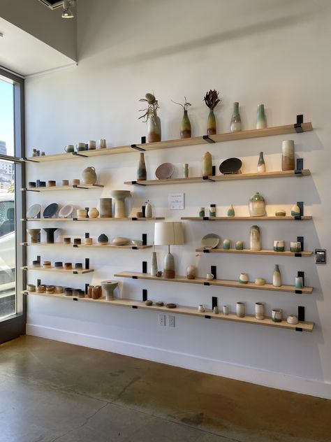 Ceramic Window Display, Retail Wall Shelving, Ceramic Store Interior Design, Ceramic Collection Display, Ceramic Display Shelves, Pottery Gallery Display, Ceramic Shop Display, Pottery Shop Display, Pottery Store Display