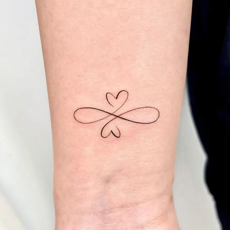 Two Hearts Infinity Tattoo, Infinity With Hearts Tattoo, Italian Grandma Tattoo, Parents And Daughter Tattoo, Joined Hearts Tattoo, Mom Of Twins Tattoo Ideas, Heart Mother Daughter Tattoo, Two Interlocking Heart Tattoos, Small Memorial Tattoos Sisters