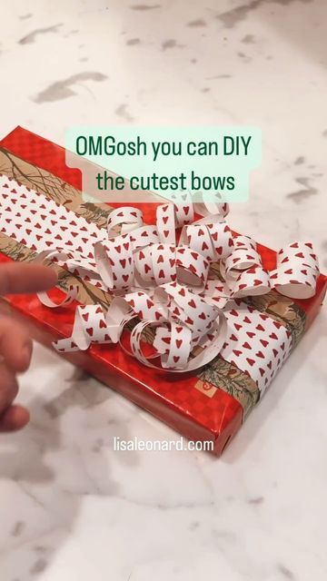 Lisa Leonard on Instagram: "😱 Friends, these bows are so easy and totally adorable! Any wrapping paper will work. Do you LOVE it? Please like and share and let me know if you try it ❤️" Bows Out Of Wrapping Paper Diy, Make A Bow From Wrapping Paper, How To Make Bows From Wrapping Paper, Wrapping Paper Bow Diy Easy, Cheap Wrapping Paper Ideas, Tissue Paper Bows Diy, Gift Wrap Bows Diy, How To Make A Bow From Wrapping Paper, Easy Gift Wrapping Ideas Simple