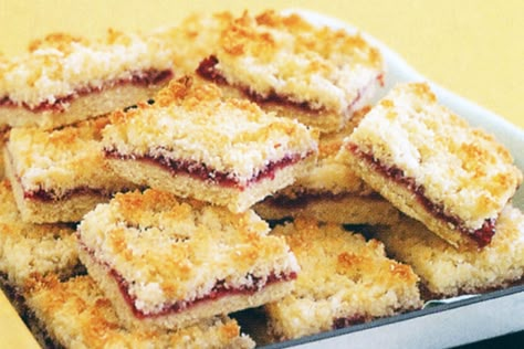 Make five-star jam and coconut slice with just a few simple ingredients. It will become a lunchbox favourite with the kids! Jam Slice, Raspberry Slice, Cakes Slices, Easy Slice, Coconut Jam, Coconut Slice, Slice Recipe, Gf Flour, Raspberry Coconut