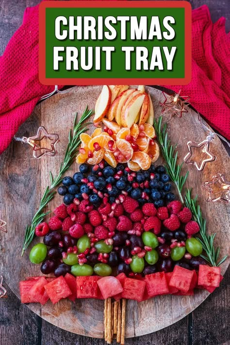 A Christmas fruit tray with a text overlay title. Christmas Fruit Breakfast, Christmas Morning Fruit Ideas, Fruit Tree Platter, Holiday Food Platters, Christmas Fruit Plate, Christmas Tree Fruit Platter, Xmas Fruit Platter Ideas, Christmas Tree With Fruit, Christmas Fruit Platter Ideas