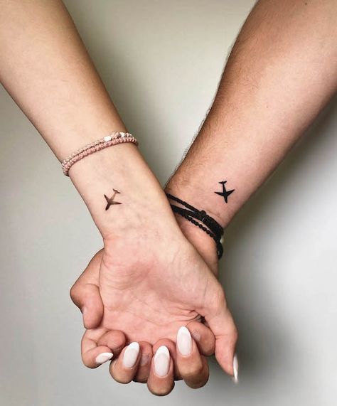 Airplane tattoos by @puertoink Airplane Couple Tattoo, Matching Airplane Tattoos, Long Distance Tattoo Ideas, Couple Tattoos With Meaning, Unique Couple Tattoos, Skull Couple Tattoo, Love Wrist Tattoo, Infinity Couple Tattoos, Love Symbol Tattoos