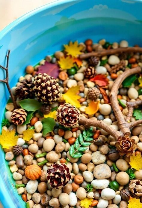 Nature-inspired sensory bins offer a perfect blend of outdoor exploration and indoor play, allowing children to engage with natural elements while sparking creativity and learning. Create a themed mini-world using natural materials like leaves, twigs, and pebbles, and watch cognitive development flourish. Curious about the magic these simple bins hold? Tree Sensory Bin, Scented Play Dough, Tactile Art, Diy Sensory, Outdoor Exploration, Preschool Classroom Decor, Sensory Art, Nature Play, Sensory Bin