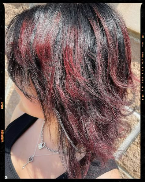 Wolf Cut Hair Red Highlights In Black Hair Short, Short Hair With Red Streaks, Short Black Hair With Red Tips, Red Frosted Tips Hair, Red Highlights In Brown Hair Wolfcut, Red Wolf Cut Short, Black And Red Hair Short Wolfcut, Hair Dye Ideas Wolf Cut, Skunk Hair Dye Red