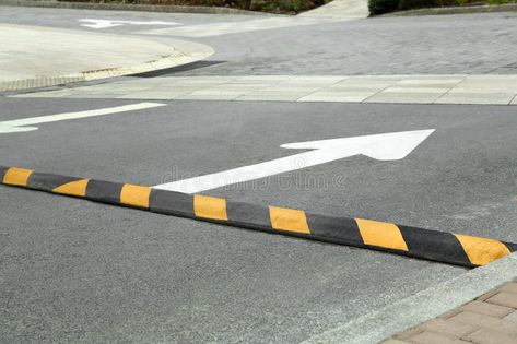 Striped speed bump on street. Road safety royalty free stock photo Street Image, Speed Bump, Road Safety, Traffic Light, Street Photo, Bump, Royalty Free Stock Photos, Finance, Royalty