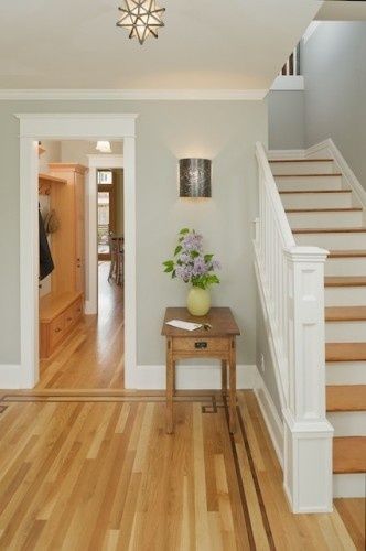 Lovely entry with light grey walls, white trim, medium hardwood Flooring On Walls, Hardwood Floor Colors, Living Room Wood Floor, Серая Кухня, Grey Wood Floors, Natural Wood Flooring, Oak Wood Floors, Light Grey Walls, Light Wood Floors