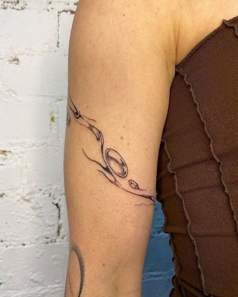 Tattoos That Wrap Around, Water Wrap Tattoo, Wrap Arm Tattoo, Energy Tattoo Spirituality, Arm Line Tattoo, Arm Wrap Tattoos For Women, Naive Tattoo, Movement Tattoo, Wrap Around Tattoos