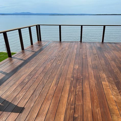 Picture this: You're celebrating tomorrow, lounging while watching fireworks over the lake, with a hot dog in hand, on a beautiful Ipe deck stained with ExoShield Walnut ~ Sounds like my kind of holiday! 🌭🎆🤩 #IpeDecking #NovaUSAWood Brown Stained Deck, Walnut Deck Stain, Dark Brown Deck Stain, Duraseal Dark Walnut On Red Oak, Azek English Walnut Deck, Ipe Deck, Watching Fireworks, Ipe Decking, Hardwood Decking