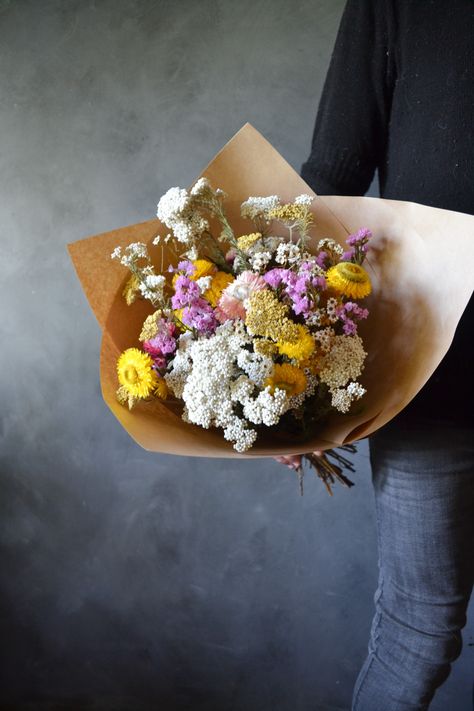 A dried bouquet of pink, white and yellow flowers, including achillea, rice flower mountain daisy and statice. White And Yellow Flowers, Rice Flower, Flower Mountain, Dried Bouquet, Dried Flower Bouquet, Flower Bouquets, Dried Flower, Yellow Flowers, Flowers Bouquet