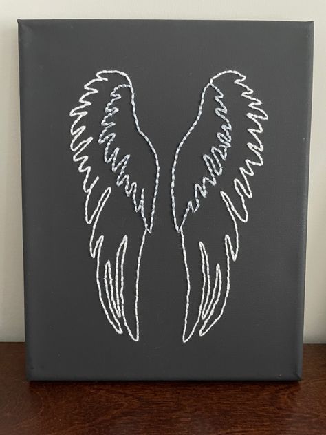 Angel wings embroidered on painted canvas Embroidery Angel Wings, Angel Wing Paintings On Canvas, Embroidered Angel Wings, Angel Wing Outline, Angel Wings Embroidery, Wings Embroidery, Punk Fashion Diy, Feather Embroidery, Basic Hand Embroidery Stitches