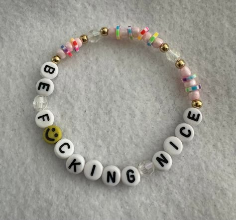 Be f*cking nice bracelet is a cute and fun friendship bracelet for anyone. It has a cute meaning but also can be funny depending the situation. Accent beads of gold are Customizable. Send me a message for customization. Funny Words For Bracelets, Funny Friendship Bracelets Words, Friendship Bracelets With Words, Bead Bracelets Words, Bracelet Ideas For Best Friends, Funny Beaded Bracelets Words, Letter Bracelet Beads Ideas Funny, Rave Kandi Bracelets Ideas, Friendship Bracelets Words