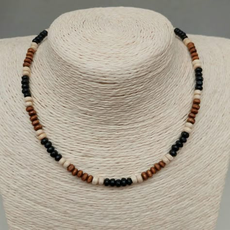 "This Wood Bead Surf Necklace has been lovingly made using brown, Black and cream 4mm wooden beads. Ideal for Men or Women, These are lightweight and tactile beads. Threaded on strong 7 strand Tiger Tail wire and finished with wire guardians, a trigger clasp and optional extender chain. Other similar styles available at: https://www.etsy.com/uk/shop/CraftHutCornwall?section_id=35841521 Typical packaging as shown in images. I have carefully selected packaging to protect your jewellery in transit, Male Beaded Jewelry, Mens Necklace Diy, Men Bead Necklace, Diy Men Necklace, Man Bracelet Beads, Necklace Wooden Beads, Beaded Jewelry Men, Man Beads Necklace, Mens Necklace Beads Handmade