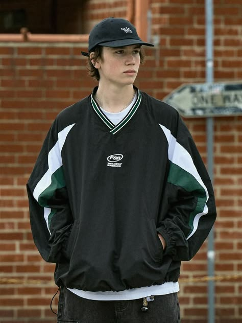 From FLUKE's skateboard line, this V-neck pullover features sporty and classic design with raglan sleeves and color-blocking panels. It's cut from durable nylon that's light, breathable, and also has windproof and water-resistant function.- Strip ribbed V-neck- Graphic embroidery at front- Two front welt pockets- Raglan sleeves with color-blocking panel- Elasitcated cuffs- Adjustable drawstring at hem- Mesh lining- Relaxed fit- Unisex wear Relaxed Sporty Outfit, Sweat Set Design, Sporty Streetwear Men, Sporty Casual Outfits Men, Sporty Style Men, Jersey Over Hoodie, Sporty Mens Fashion, Mens Sporty Style, Vintage Athleisure