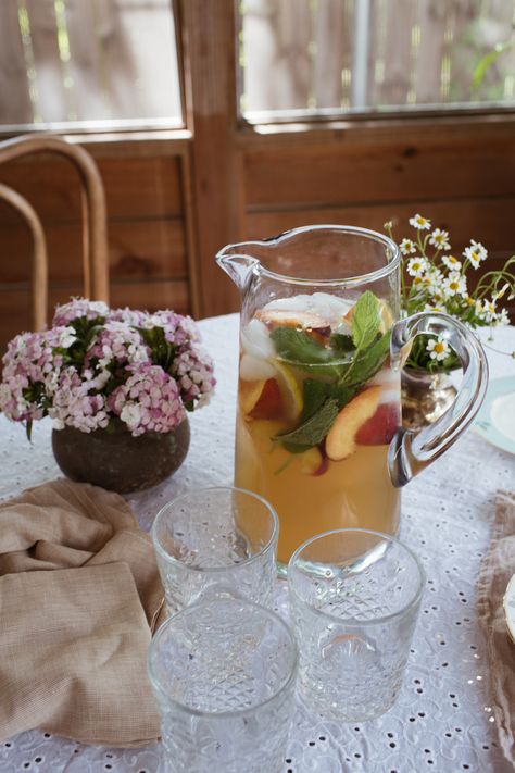 spiked sweet tea. It’s a simple combination of peach iced tea and vodka over ice, with fresh peaches, mint, and lemon slices for refreshing garnishes. Serve Ice At Party, How To Serve Hot Tea At A Party, Garden Party Drinks Mocktails, How To Keep Drinks Cold Outside Party, Keeping Drinks Cold At A Party, Iced Tea Party, Puff Pastry Cream Puffs, Phyllo Cups, Almond Pastry