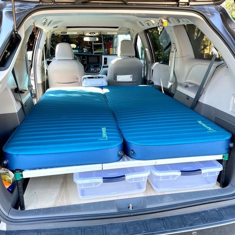 This is a sleeping platform I installed in my 2017 Toyota Sienna minivan for road trips and camping.  Using commercial kitchen shelving and trimmed down posts that are attached to a 4 by 8 foot sheet of birch plywood.  The shelf sizes are two 24”x48” and two 24”x36”.  Nothing is permanently attached to the van.  Sleeps two very comfortably with Therm-a-Rest Mondo Kings! Road Trip Bed In Car, Toyota Sienna Camper Conversion, Summer Villa, Van Builds, Minivan Camper, Minivan Camper Conversion, Suv Camper, Minivan Camping, Kitchen Shelving