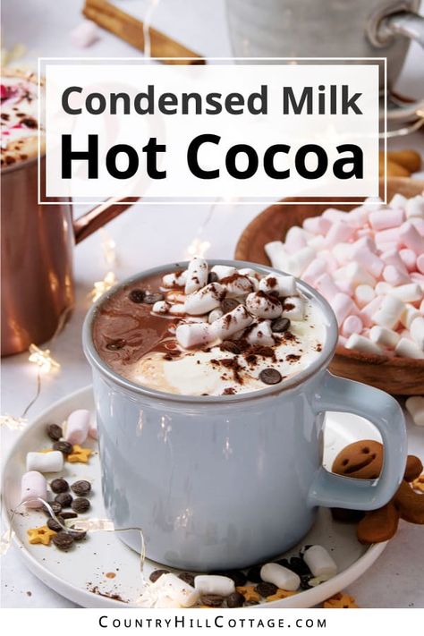 Condensed milk hot chocolate is the sweetest and creamiest way to warm up this winter! Made with 5 ingredients, the recipe is a twist on traditional hot cocoa, perfect to cozy up during the holidays and colder months. Thanks to condensed milk and cocoa powder, this drink has a rich chocolate flavor and thick, dreamy texture. Top your hot cocoa with marshmallows, chocolate chips, cinnamon, hot fudge sauce, cookies, peppermint, peanut butter, Biscoff and white chocolate. | CountryHillCottage.com Hot Cocoa With Sweetened Condensed Milk, Hot Cocoa With Almond Milk, Condensed Milk Hot Chocolate, Hot Chocolate With Condensed Milk, Chewy Caramels Recipe, Chocolate With Cocoa Powder, Mint Hot Chocolate Recipe, Gourmet Drinks, Hot Chocolate With Cocoa Powder