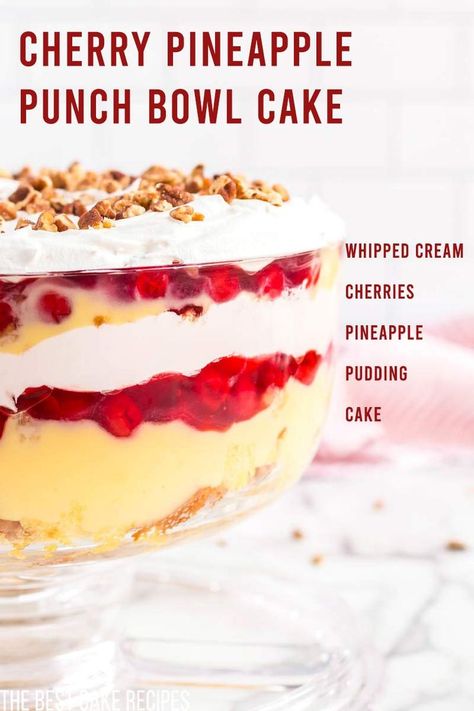 A deliciously fresh cake recipe that is perfect for warmer weather! Make this easy Cherry Pineapple Punch Bowl Cake recipe your go-to dessert for summer entertaining! This Cherry Pineapple Punch Bowl Cake is the perfect recipe to feed a crowd for summer barbecues, picnics, and parties.  Guests will love the tangy/sweet flavors of the cake, fruit, and Cool Whip combo. You’ll love that this recipe uses cake and pudding mix from a box, making it extremely easy to make and serve! Punch Bowl Dessert Recipes, Fruit Punch Bowl Cake Recipe, Cake Bowl Desserts, Punch Bowl Cake Recipe Easy, Punchbowl Cakes, Punchbowl Cake, Cherry Trifle Recipes, Cherry Trifle Desserts, Strawberry Punch Bowl Cake