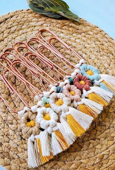 So glad to see you here! Flower Daisy bookmarks are a perfect way to add a pop of color to your books, journals,planners, & more. They make great gifts for teachers,tutors,students,friends,& book lovers alike! Flower macrame bookmarks are made out of 100% recycled cotton. Attached is a 4 inch rose gold paper clip.  Flower bookmark measures about 6 inches in length including flower and fringe. As each flower bookmark is handmade,there may be slight difference in variation,size,and appearance.  We Bookmark Macrame, Macrame Bookmarks, Macrame Bookmark, Flower Macrame, Friends Book, Rose Gold Paper, Mini Macrame, Friend Book, Flower Daisy